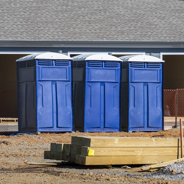 what is the cost difference between standard and deluxe portable toilet rentals in Ulster